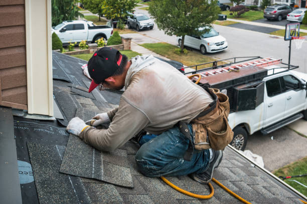Professional Roofing technician working in Elizabeth, CO